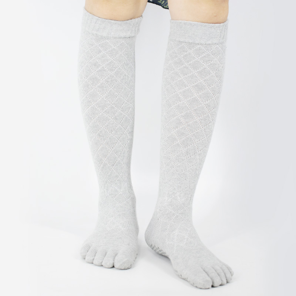 Chaussettes hautes de yoga aux genoux