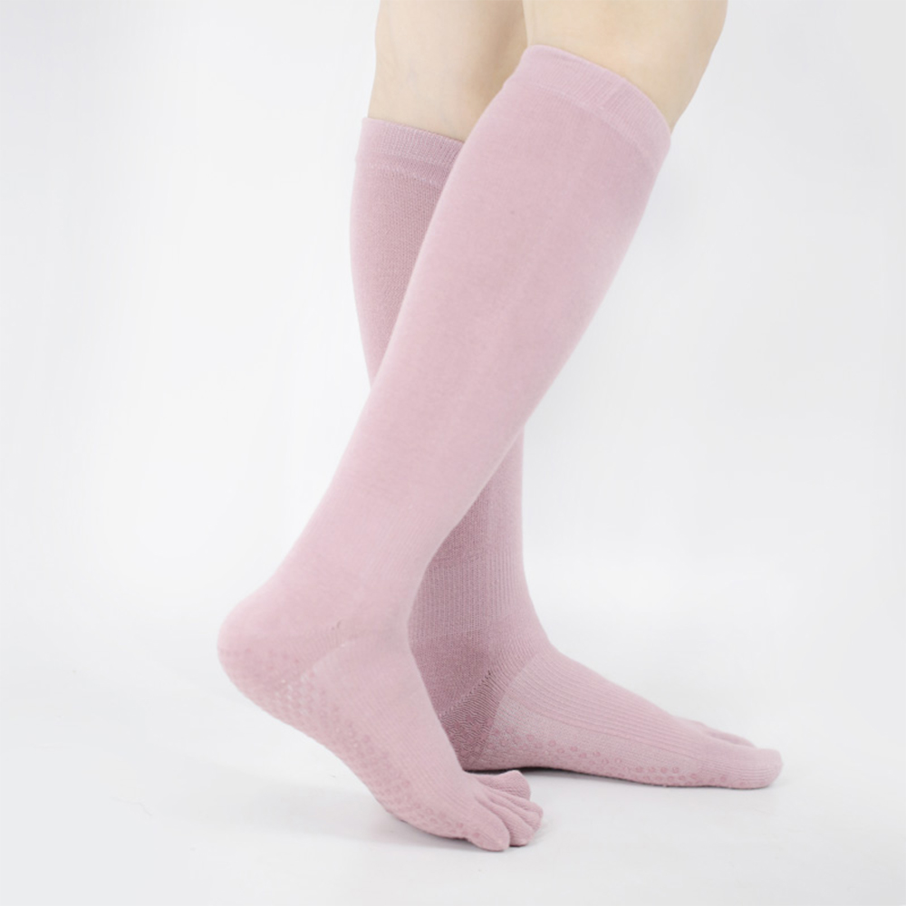 Chaussettes de yoga à tube moyen de couleur unie