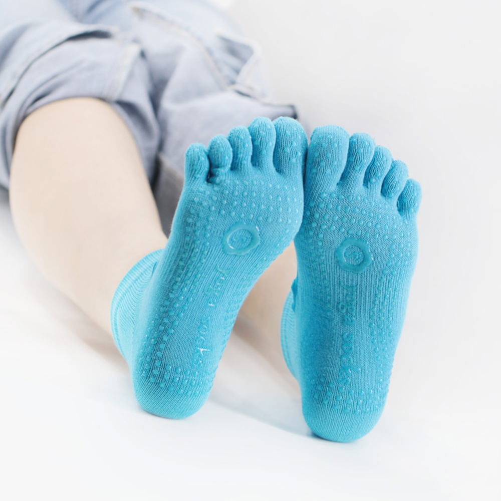 Chaussettes de yoga creuses en tissu élastique à cinq orteils